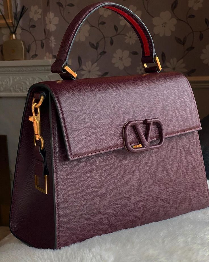 luxury burgundy Valentino-style handbag